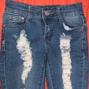 Mid blue ripped jeans